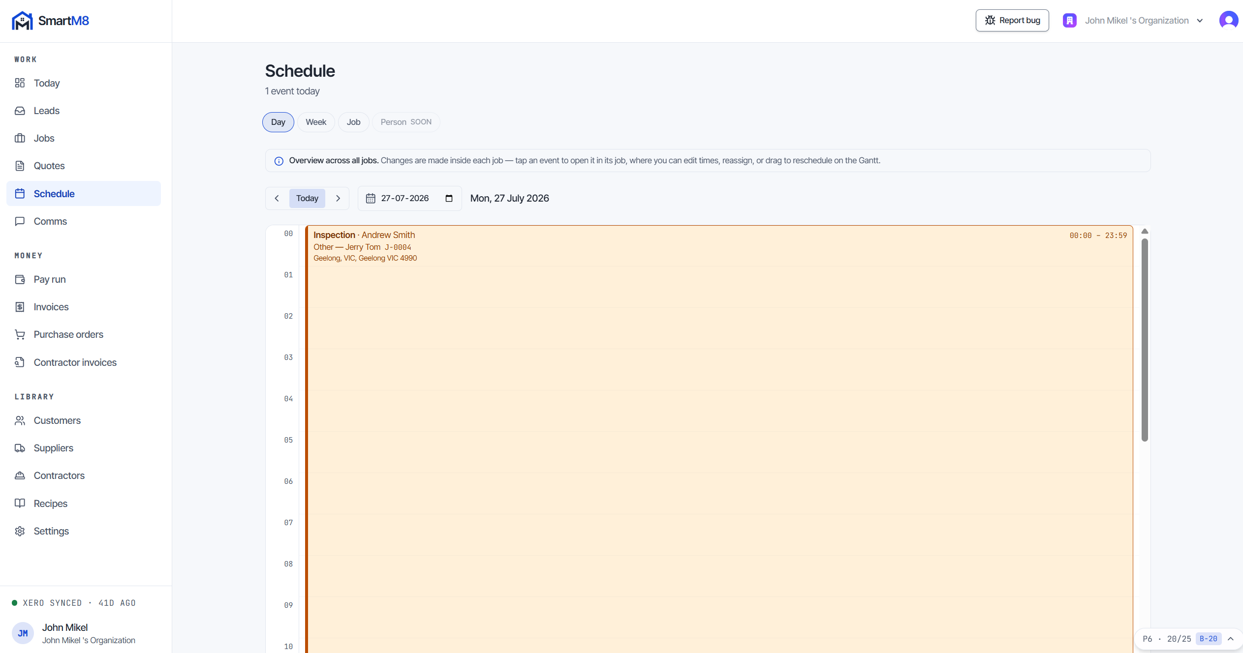 The SmartM8 schedule. A day timeline lays events out against the hours of the day, each card colour-coded by job and showing the event title, the trade assigned, the job number and the site address. Tabs switch between day, week and per-job views.